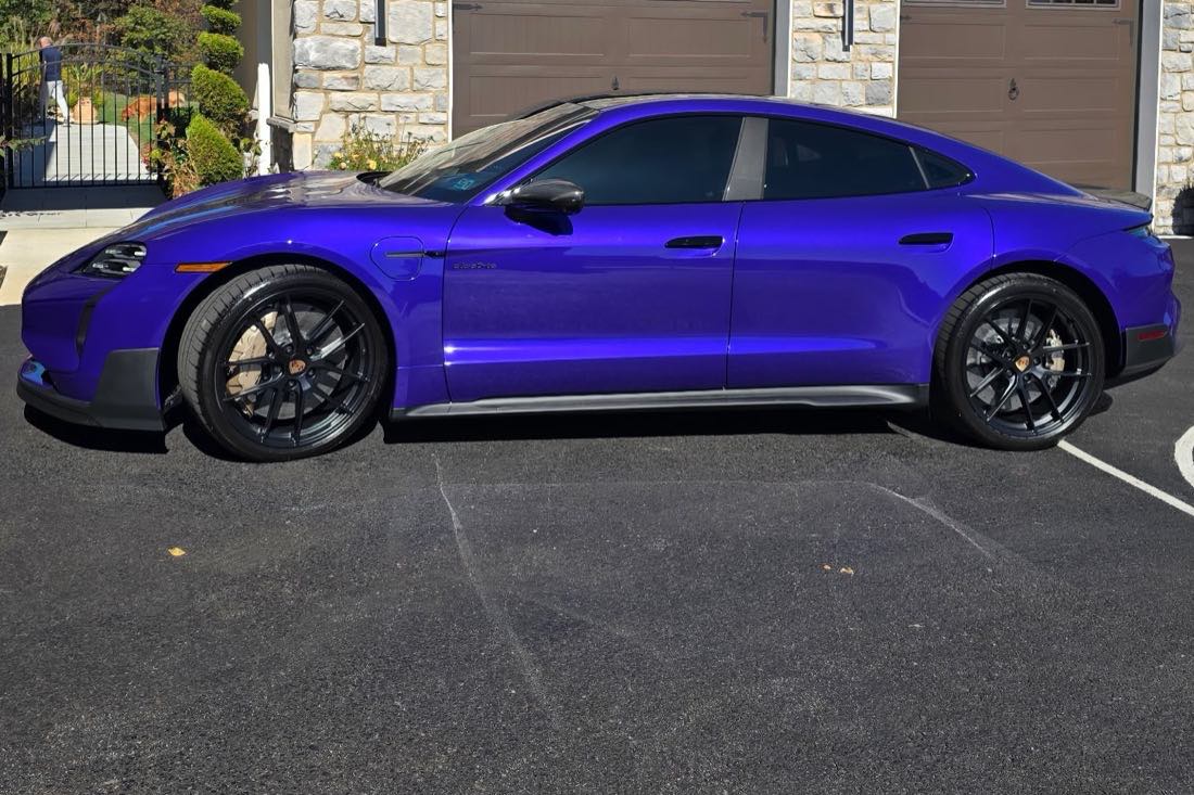 Purple Porsche Taycan Turbo GT in the driveway